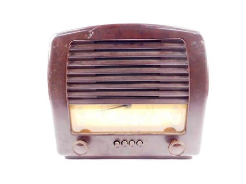 A GEC brown bakelite radio, Cat No BC4650L, Inst. No KX1945, 34cm H, 37.5cm W.