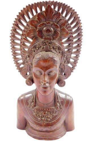 A 20thC Balinese carved wooden bust, of a lady wearing an ornate head dress, 33cm H.