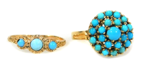 Two turquoise set dress rings, comprising an 18ct gold cluster ring, in raised basket design, ring size J½, and a yellow metal and turquoise ring, unmarked. (2)