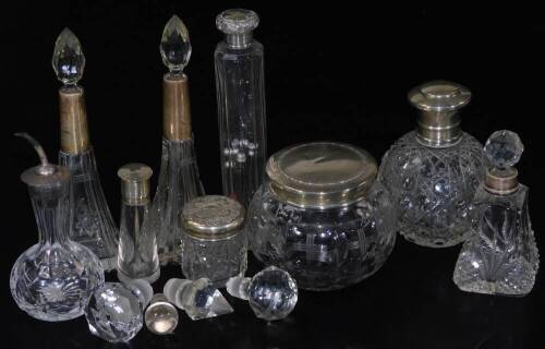 Various silver cut glass and crystal dressing table pieces, to include needle jar, 18cm H, a cut glass perfume bottle, with silver collar and lid, London 1915, matched pair of cut glass perfume bottles of shaped form, various others, etc. (a quantity)