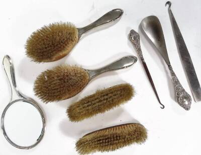 A George V silver dressing table set, comprising two hair brushes, 25cm W, two clothes brushes and a hand mirror, marked Annie, and a small quantity of other silver dressing table items, mainly Birmingham 1926. (a quantity) - 2