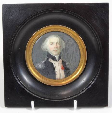 Early 19thC English School. Portrait miniature of a soldier with shoulder epaulettes in waistcoat, facing front, probably gouache on ivory, 6.5cm Dia.