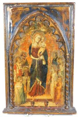 A 19thC religious icon, on pine panel with heavily carved arch, set with Madonna and Child and various other figures, picked out in colours, 40cm H, 27cm W, 4cm D.