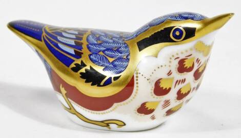 A Royal Crown Derby paperweight ornament finch, gilt stopper, printed marks beneath, 6cm H.