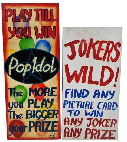 Two circus or fairground wooden signs, Joker's Wild! and M Parkin Play Till You Win Pop Idol, 120cm x 49cm. (2)