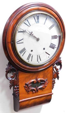 A Victorian flame mahogany American dial wall clock, 29cm Dia, the carved case with visible pendulum, Roman numeric dial and eight day movement. 68cm H