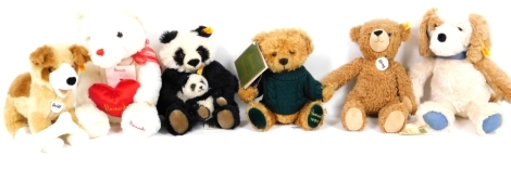 Various Teddy bears, Harrods etc., to include a white bear holding heart, 38cm H, late Steiff Teddy bears, dog, panda, etc. (a quantity)