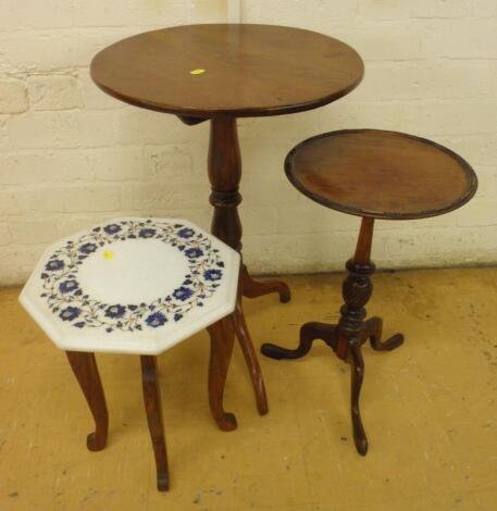 A XIX century walnut occasional table on a tripod base