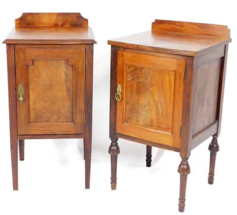 A matched pair of early 20thC mahogany pedestal cabinets, each with single galleried backs and front doors one raised on square tapering legs, 89cm H, 47cm W, 47cm D. (2)