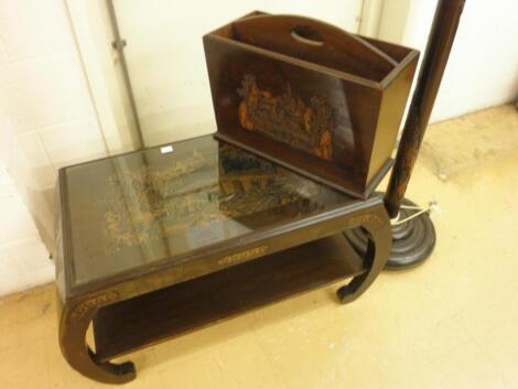 A carved Eastern hardwood two tier coffee table