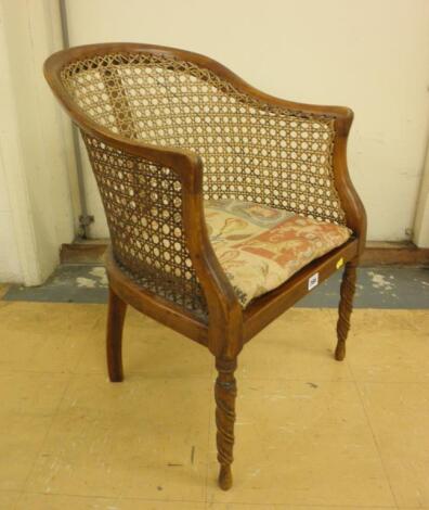 A late XIX/early XX century stained beech child's bergere armchair