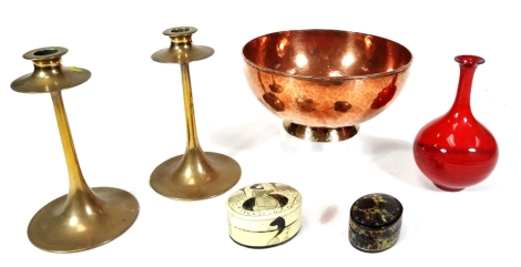 A Middle Eastern design papier mache box, of oval outline with removable lid, 8cm W, a further Kashmir India box, two brass Arts and Crafts style candlestick 22cm H, a hammered copper vessel on circular foot and a Studio glass vase in red speckled decorat