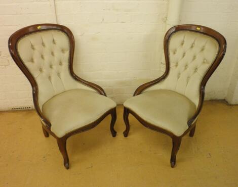 A pair of Victorian style spoonback side chairs