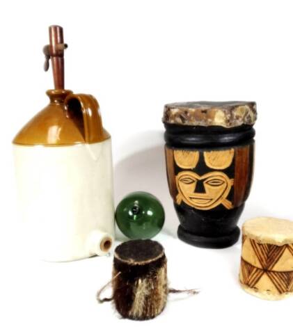 20thC African tribal drum, with wooden body and hide top, 35cm H, two other smaller examples, green glass ships cast of circular form, and a stoneware flagon with wooden stopper, with an impressed mark 2. (5)