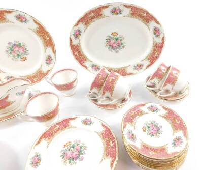 A Coalport porcelain part dinner and tea service decorated in the Montrose Pink pattern, comprising pair of vegetable tureens and one cover, meat platter, sauce boat on stand, single dinner plate, six dessert and side plates, cream jug, six teacups and sa - 2