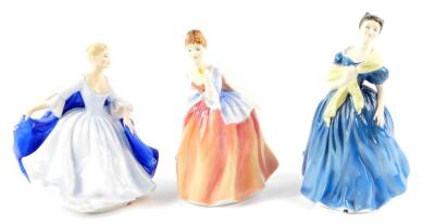 Three Royal Doulton figures, comprising Adrienne HN2304, Dulcie HN2305, and Fleur HN2369.