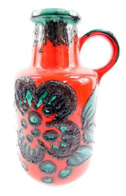 A Scheurich 1970's pottery fat lava vase, decorated in green with stylized flowers against a red ground, shape no 408/40, raised marks, 39 ½ cm high