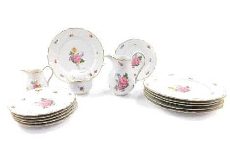 A set of six Hutschenreuther early 20thC porcelain dinner plates, of fluted form, painted with sprays of flowers, for H. Bath, Mönckebergstr. Hamburg, together with six dessert plates, sucrier and cover, milk and cream jugs (15)