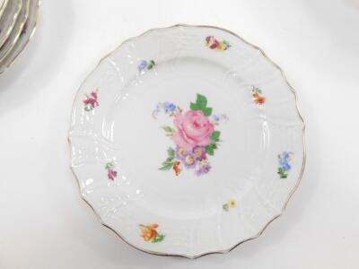 A set of six Hutschenreuther early 20thC porcelain dinner plates, of fluted form, painted with sprays of flowers, for H. Bath, Mönckebergstr. Hamburg, together with six dessert plates, sucrier and cover, milk and cream jugs (15) - 2
