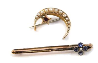 A Victorian seed pearl and garnet brooch, formed as crescent moon and star, set in pierced yellow metal, together with an Edwardian 9ct gold sapphire and seed pearl set floral bar brooch, 4.0g