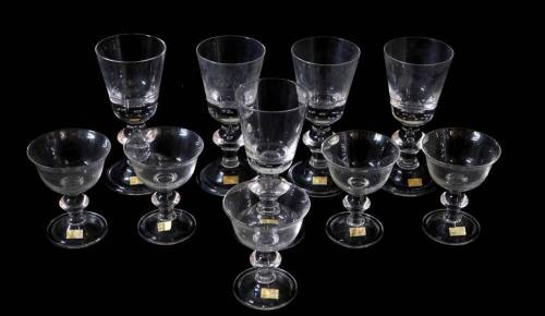 A set of five Hadeland cut glass wine goblets, the bucket shaped bowls with air bubble inclusions, raised on a single knop stem with tear drop and bubble inclusion, raised on a conical folded foot, together with five similar champagne cups. (10)