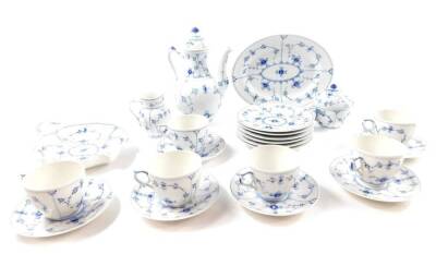 A Royal Copenhagen porcelain blue and white part coffee service, decorated in the Lace pattern, comprising coffee pot, sucrier and cream jug, six cups, saucers and plates, together with an oval dish, and a leaf shaped dish. (23)