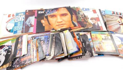 Vinyl records and singles, including Elvis Presley G.I Blues, I Got Lucky and Separate Ways, 1980's stars including Prince, Fergal Sharkey, Alison Moyet, WHAM! and childrens singles including The Thunderbirds, Stingray, The Flintstones and The Jetsons (Qt