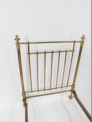 A Victorian brass single bed, with side irons. - 2