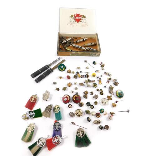 Boy Scout memorabilia, including Golden Shred golly badges, further Boy Scout badges and buttons, travelling knives and forks, and scout whistles. (qty)