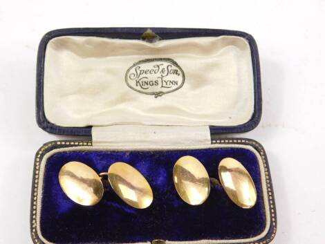 A pair of 9ct gold double oval link cuff links, unengraved, 5.9g.