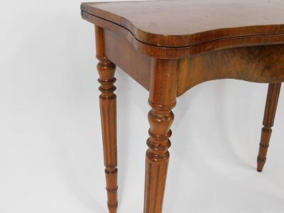 A burr walnut serpentine fold over tea table, raised on turned and fluted legs, 77cm H, 84cm W, 42cm D. - 3