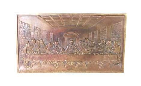 After Leonard De Vinci. A brass plaque cast in relief of The Last Supper, 35cm H, 63.5cm W.