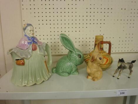 Two Sylvac rabbits, Beswick, a novelty teapot etc