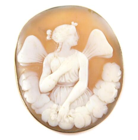 A shell cameo brooch, half length portrait of a nymph, above a flower garland, set in yellow metal, with safety chain as fitted.