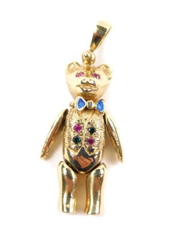 An articulated Teddy Bear pendant, gem set in yellow metal, hall marked for London, 14.6g.