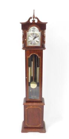 A late 20thC Highlands mahogany cased grandmother clock, Tempus Fugit break arch silvered dial, with chapter ring bearing Roman numerals, eight day three train movement with Westminster chime, the plain case with glass fronted trunk door, raised on a plin