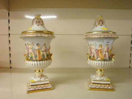 A pair of Capo di Monte urns