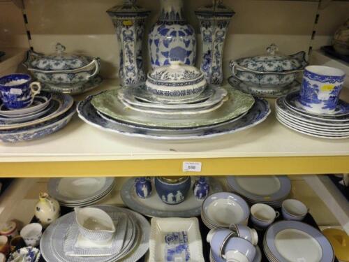 A quantity of china, mainly blue & white, to include:- tureens & covers,