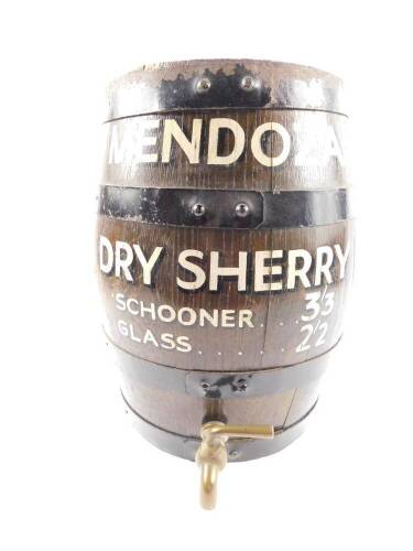 A Mendoza oak and cast iron bound dry sherry barrel, with brass tap, advertising a schooner at 3s 3d, and a glass 2s 2d, 38cm H.