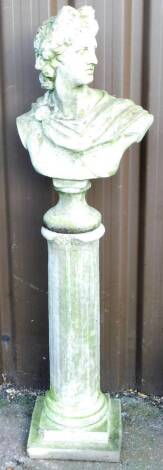 A late 20thC concrete garden statue of a classical figure, quarter profile on circular base, 60cm H, with stone column.