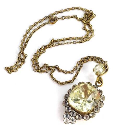 A Victorian design paste stone set necklace, with central raised citrine type stone, surrounded by white paste stones, in a gilt metal setting on copper chain, the pendant 6cm H.