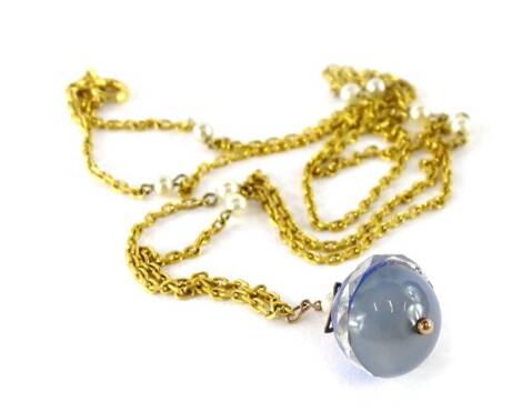 A modern Eastern style pendant and chain, with blue and clear ball design drop, the chain set with seed pearls, gold plated stamped clasp, Cico box.