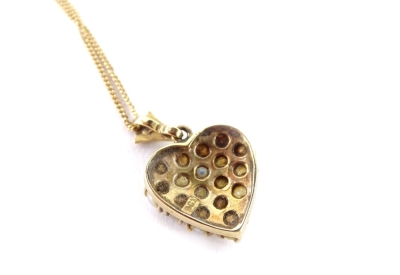 A Victorian 9ct gold pendant and chain, the heart shaped pendant set with various seed pearls, in claw setting, on a fine link 9ct gold chain, the pendant 1.7cm H, the chain 42cm L overall, in W Mansell of Lincoln box, 4.9g all in. - 2