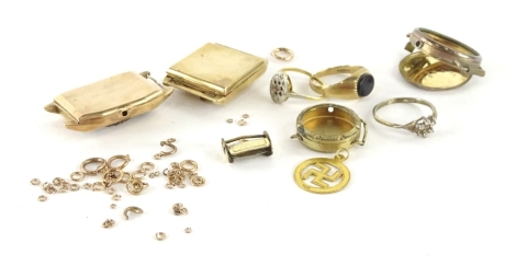 A quantity of 9ct gold and other loose and broken pieces, to include three 9ct gold watch cases, a 9ct gold dress ring (AF), a 9ct gold pendant, 9ct gold signet ring, various loose gold links, weight 31g, a gilt metal watch case, gilt metal fastening and 