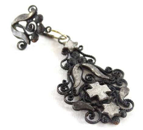 A Victorian pendant/earring, with scroll cross and star design, of black metalwork form, 7cm H.