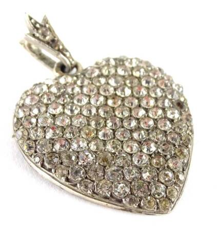 A late 20thC heart shaped pendant, set with varying coloured white/yellow paste stones, steel back 4cm H, in Lewis Abbott's of St Leonards on Sea box.