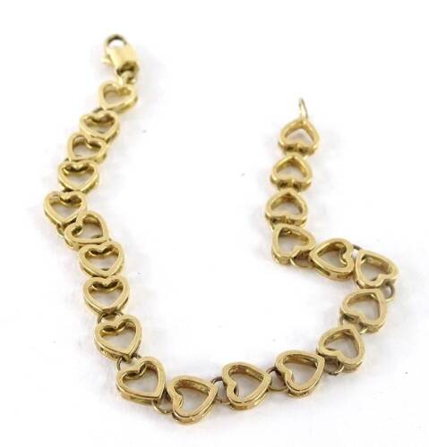 A 9ct gold heart shaped bracelet, with various heart links, 19cm L overall, 7.1g, boxed.