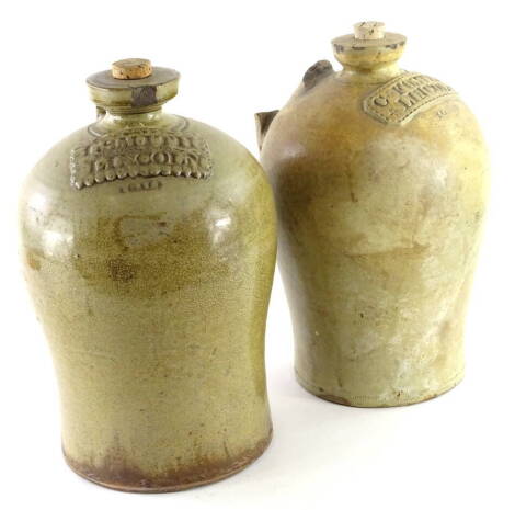 Two 19thC stoneware baluster shaped flagons, for I Smith of Lincoln and C Foster of Lincoln. (AF)