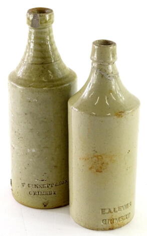 Two Grimsby related stoneware bottles, stamped T Bennett and Son, and E A Lewis.