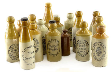 A collection of Lincolnshire related stoneware ginger beer bottles, to include makers from Grantham, Sutton on Sea, Alford, Grimsby, Skegness, etc.